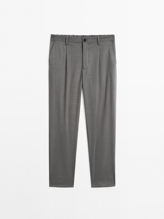 Relaxed fit trousers with darts