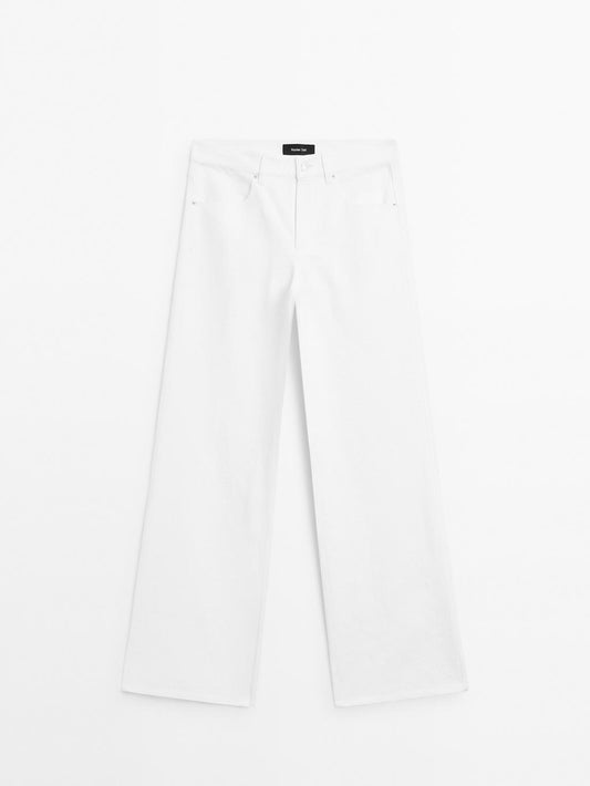 Textured wide-leg denim-effect trousers
