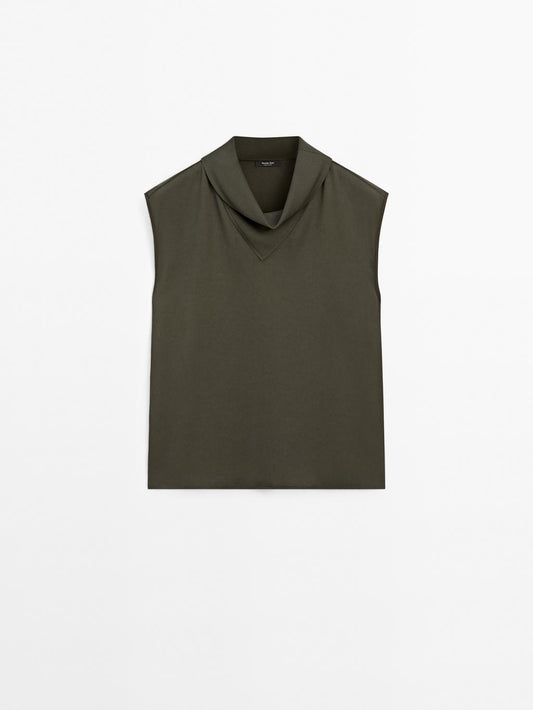 Flowing blouse with draped neck detail