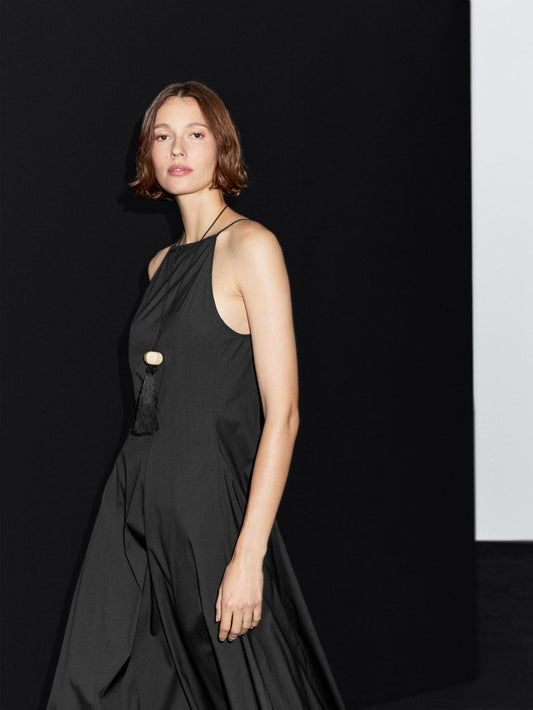 Long halter neck dress with flounce