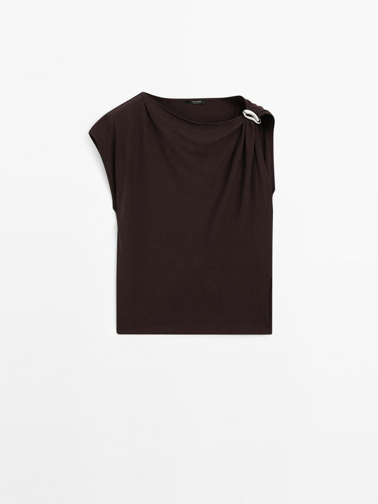 Draped neckline top with brooch detail