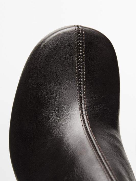 Shiny leather high-heel ankle boots