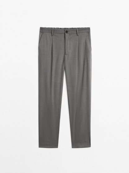 Relaxed fit trousers with darts