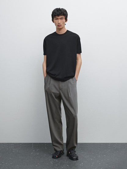 Relaxed fit trousers with darts