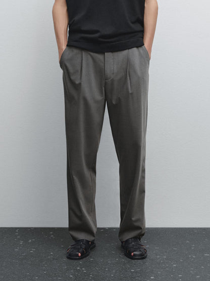 Relaxed fit trousers with darts