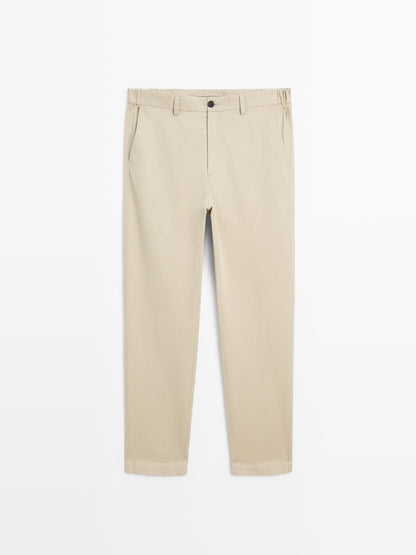 Slim fit trousers with elastic side detail