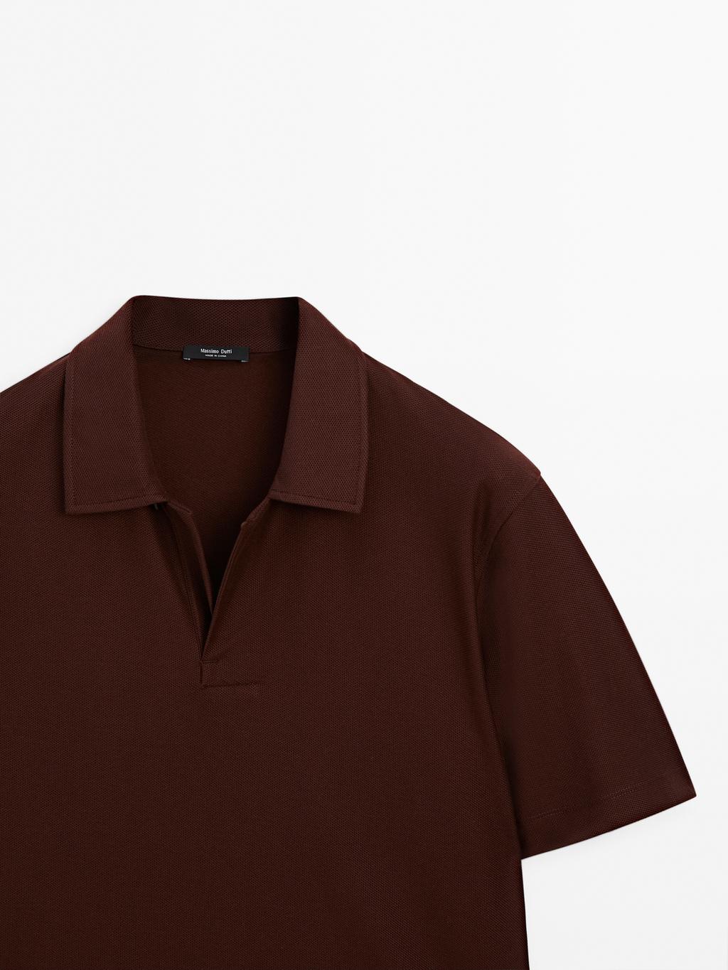 Textured polo shirt with hidden button