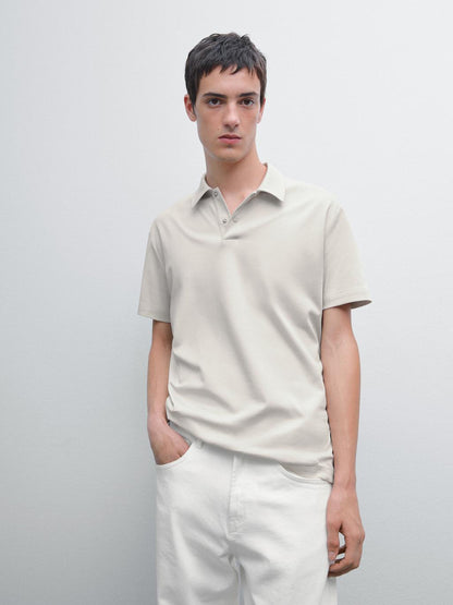 Short sleeve polo shirt with snap-button placket