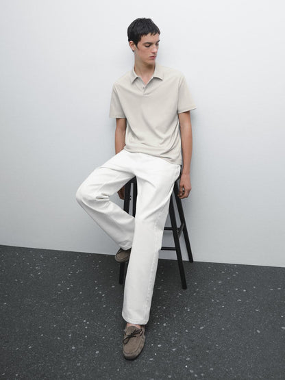 Short sleeve polo shirt with snap-button placket