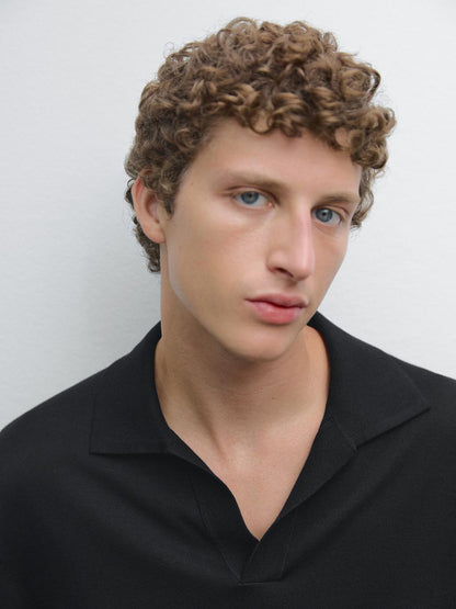 Knit sweater with a polo collar