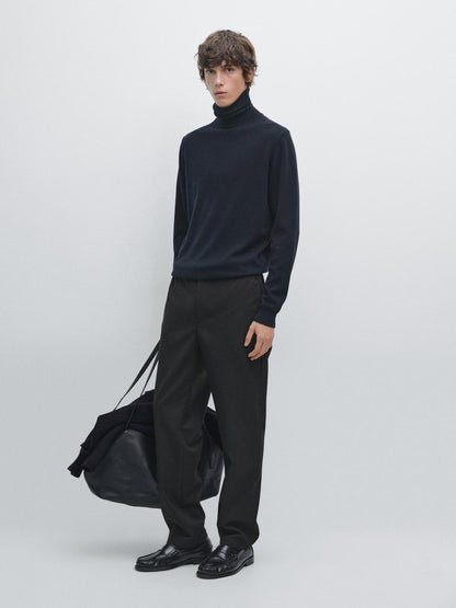 Wool blend knit sweater with high neck