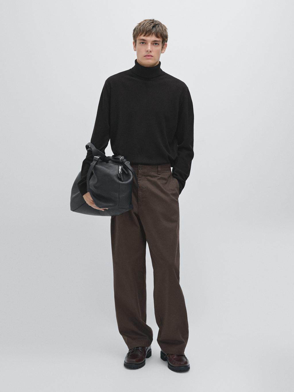 Wool blend knit sweater with high neck