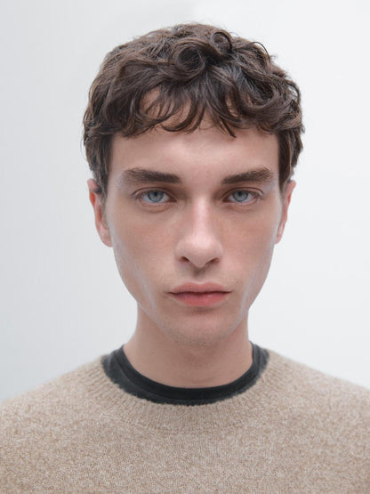 Flecked crew neck knit sweater