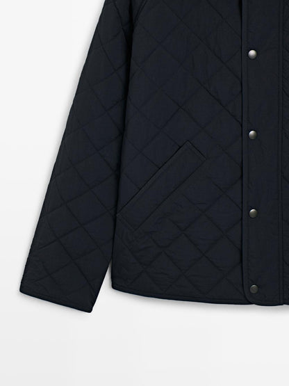 Quilted jacket with corduroy collar
