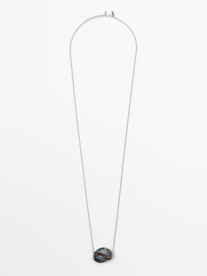 Necklace with ceramic pendant