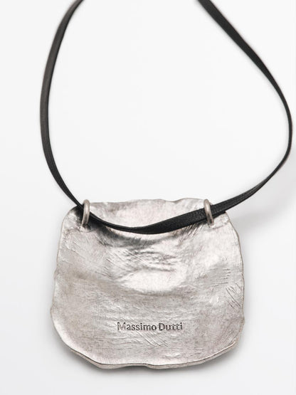 Textured medallion necklace