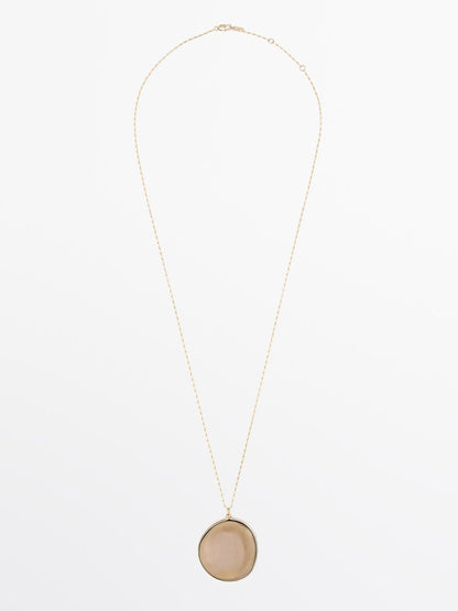 Necklace with translucent stone pendant