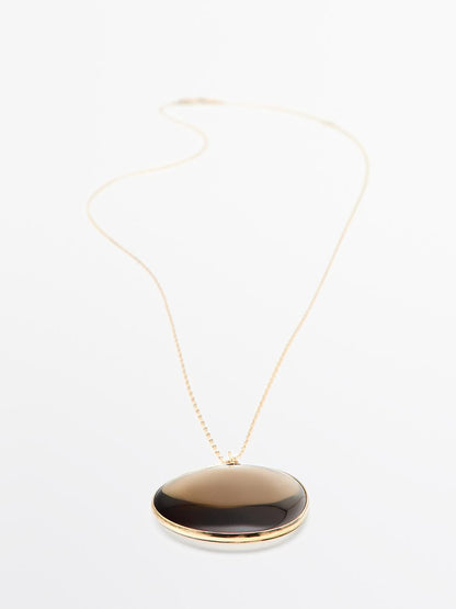 Necklace with translucent stone pendant