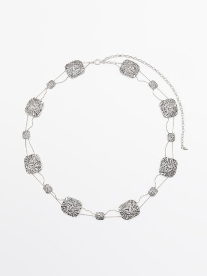 Textured medallion chain belt