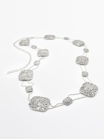 Textured medallion chain belt