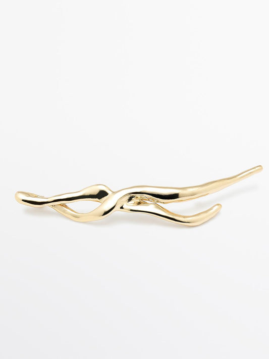 Abstract metal brooch