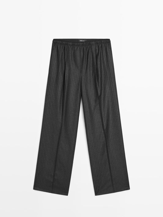 Darted pinstripe trousers