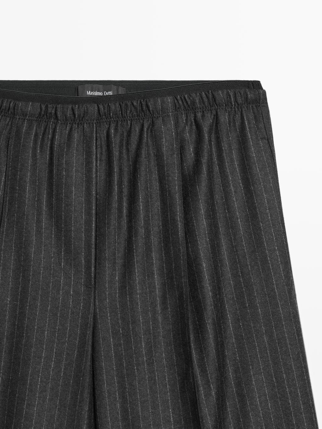 Darted pinstripe trousers