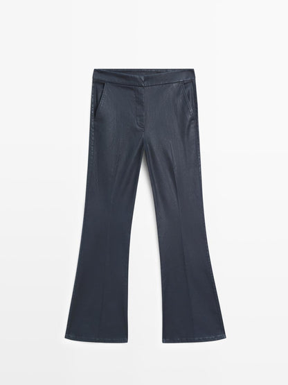 Waxed flare fit trousers