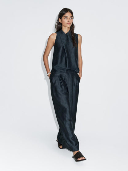 Loose-fitting linen blend trousers