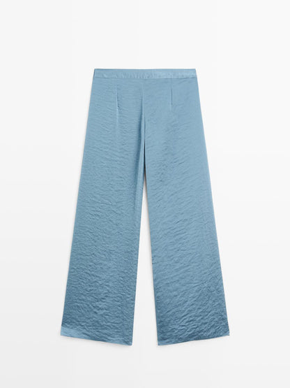 Flowing palazzo trousers with slits