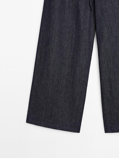 High-waist wide-leg jeans with belt