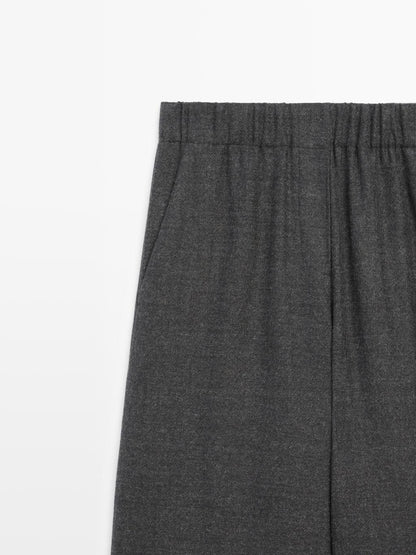 100% wool wide-leg textured trousers