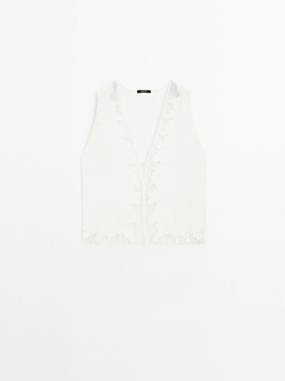 Flowing blouse with lace detail