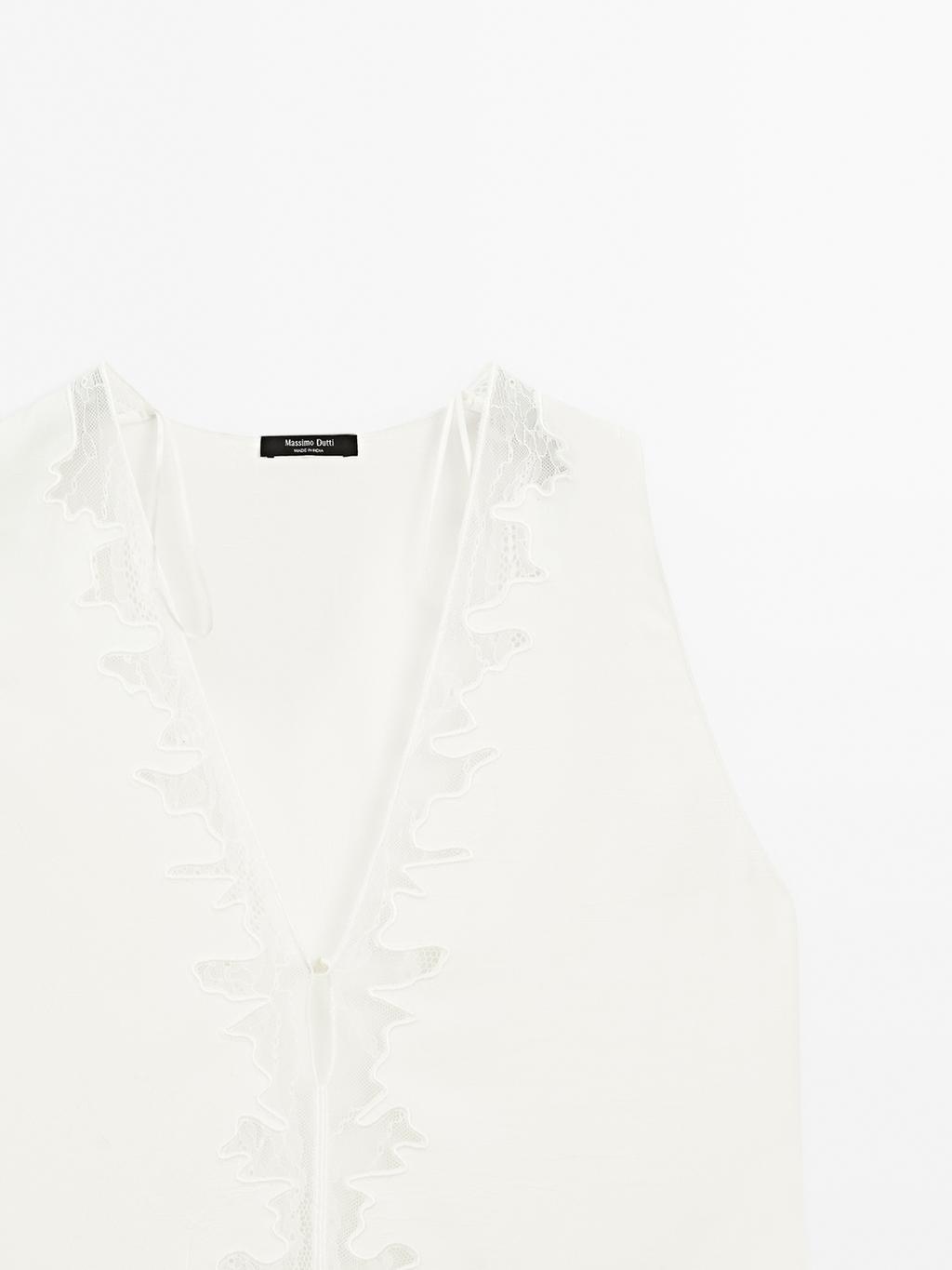 Flowing blouse with lace detail