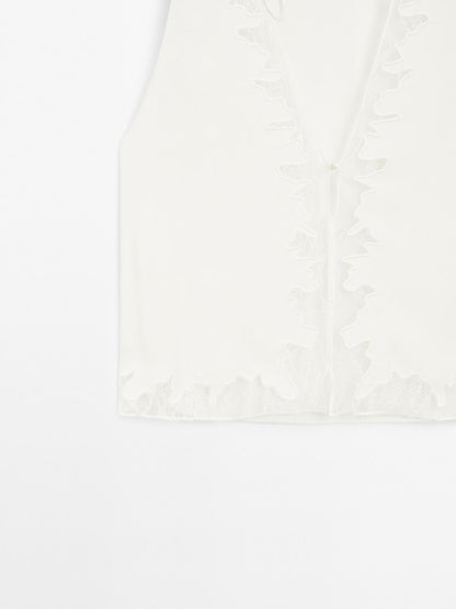 Flowing blouse with lace detail