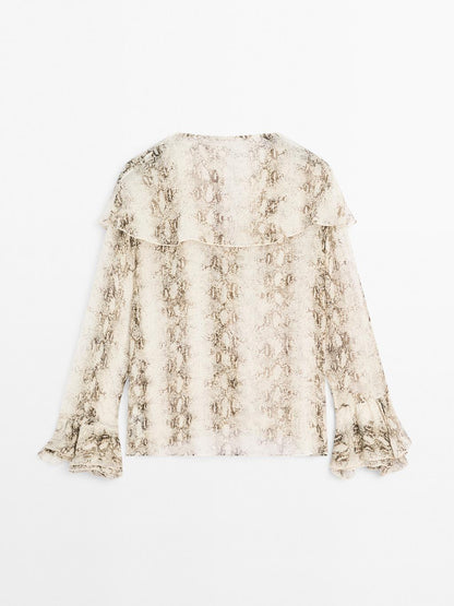 Snakeskin print blouse with ruffles