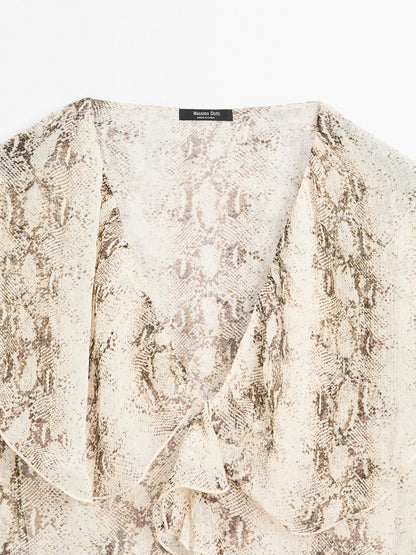 Snakeskin print blouse with ruffles