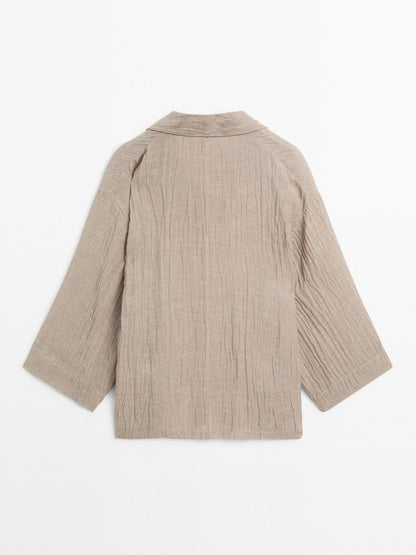 Flowing linen blend blouse with open neckline