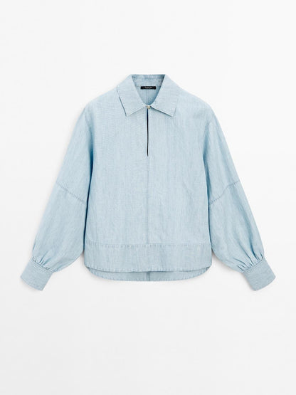 Oversize denim blouse with puff sleeves