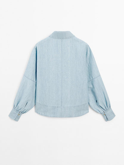 Oversize denim blouse with puff sleeves
