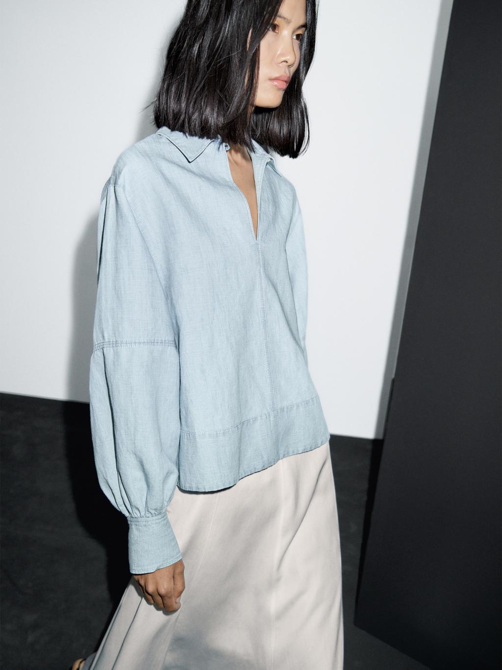 Oversize denim blouse with puff sleeves