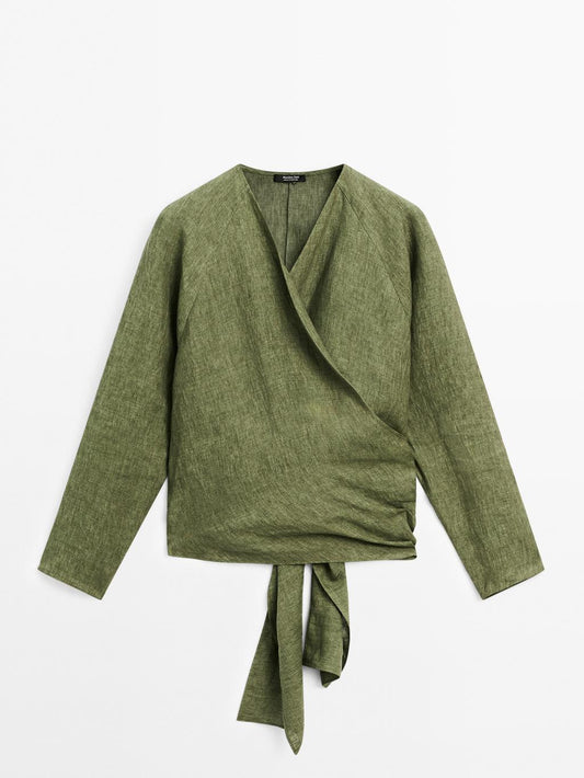 Flowing linen blouse with tie detail at the waist