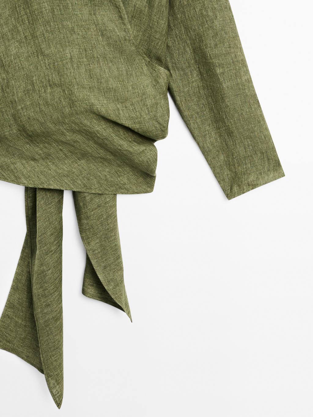 Flowing linen blouse with tie detail at the waist