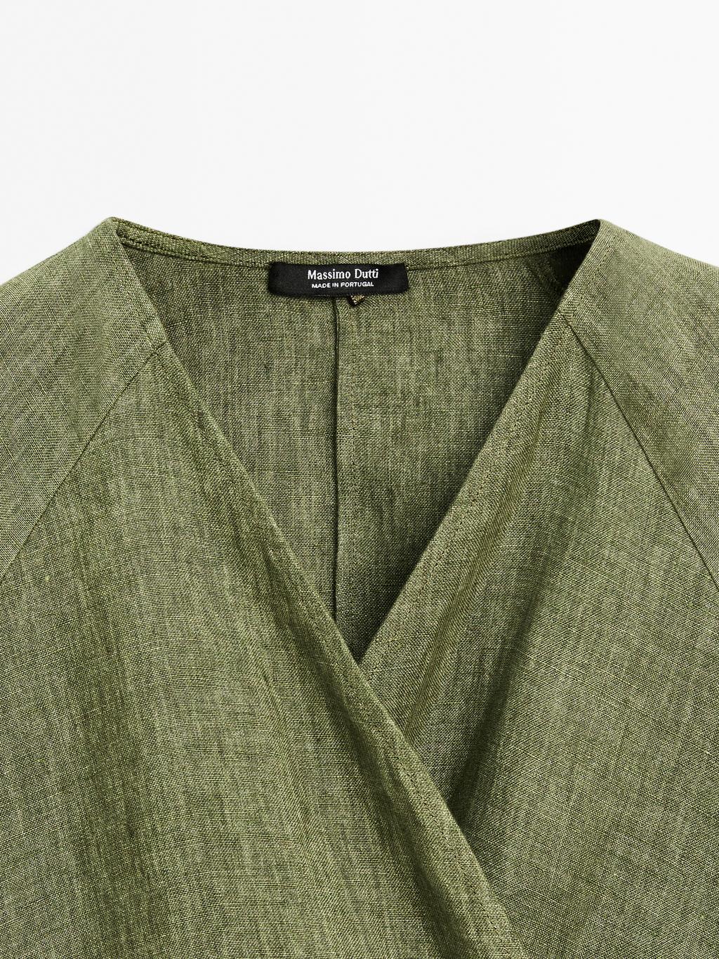 Flowing linen blouse with tie detail at the waist