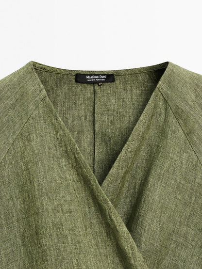 Flowing linen blouse with tie detail at the waist