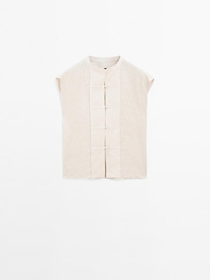 Waistcoat with buttoned chest detail