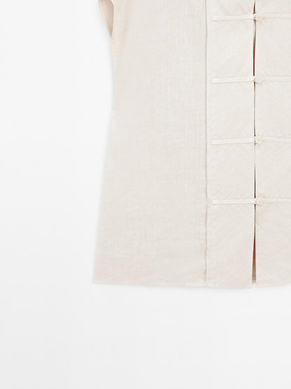 Waistcoat with buttoned chest detail