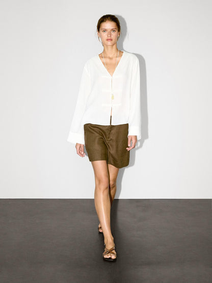 Flowing linen blend blouse with V-neckline