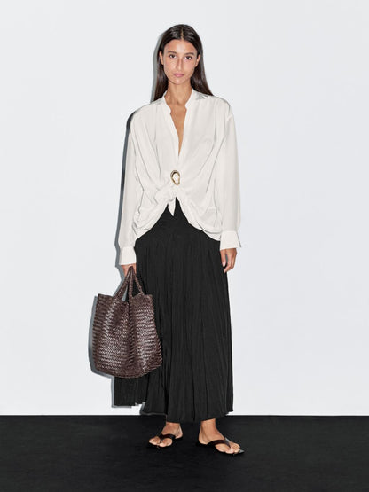 Blouse with knotted neckline and brooch detail