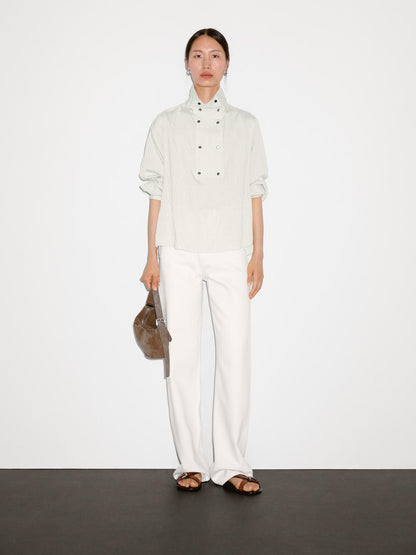 Flowing shirt with button detail on the chest